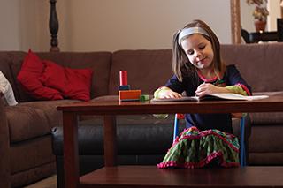 Young girl doing quiet activity